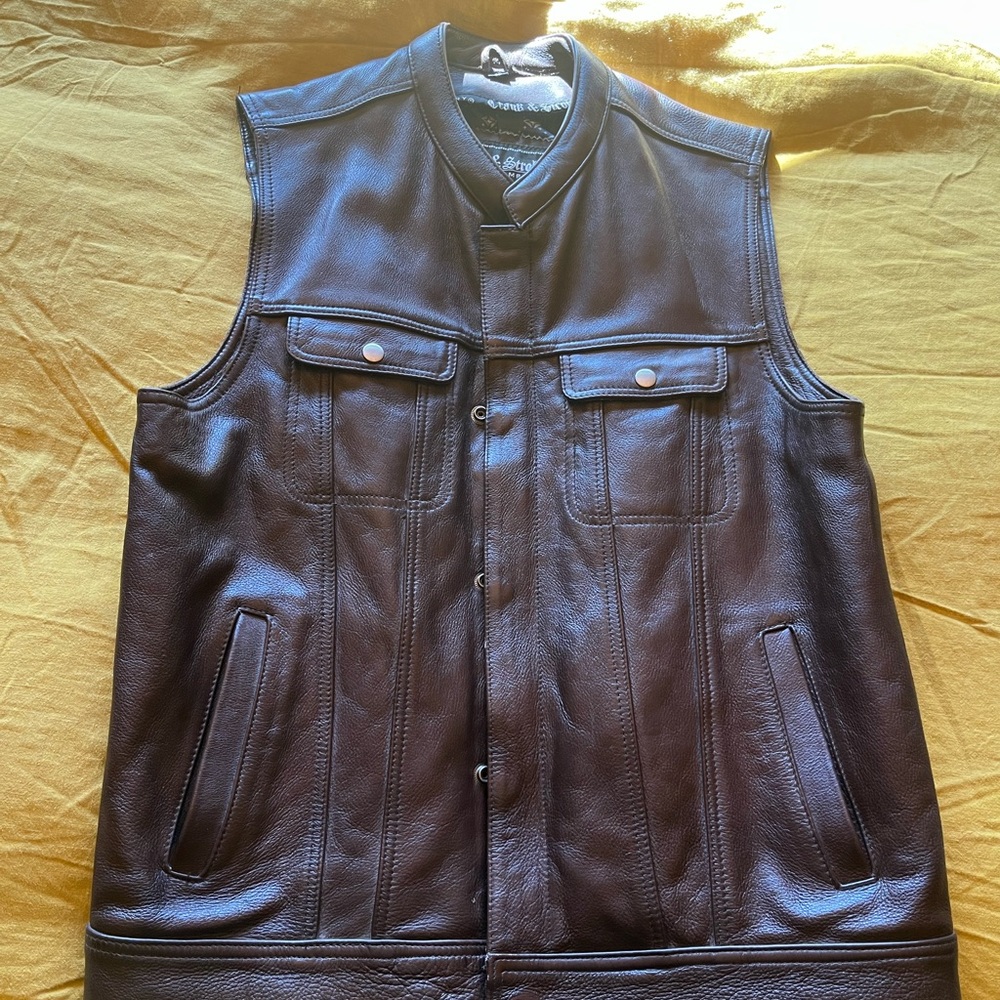 Crank and stroker leather vest, worn twice basically brand new. Brown size small